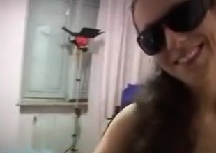 Italian slut bonks while wearing sun glasses.